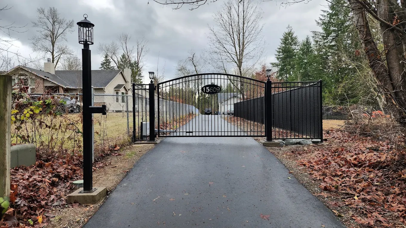 Black metal driveway gate residential property