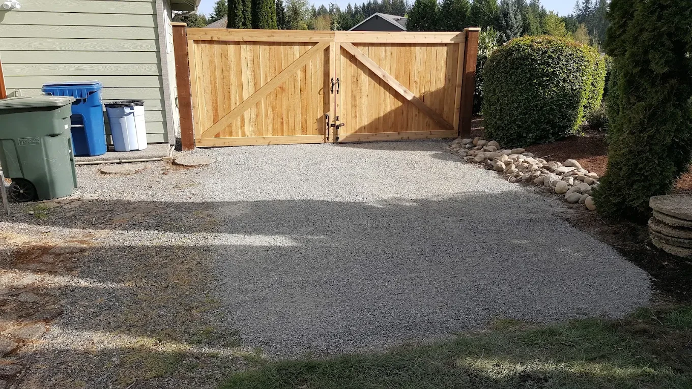Wooden driveway gate gravel driveway