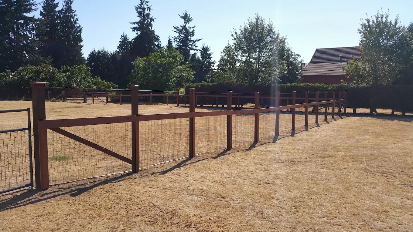 Horse ranch paddock with wooden fencing