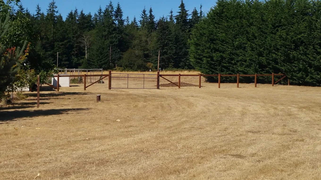 Rural horse ranch with wooden fencing