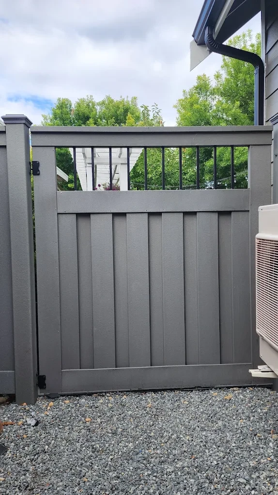 Modern gray gate with window panels
