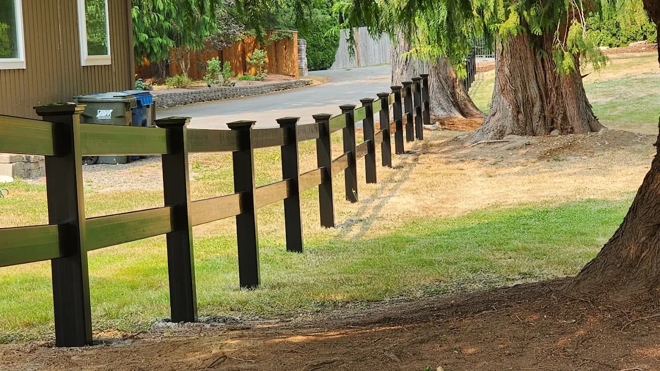 Composite fence along rural property