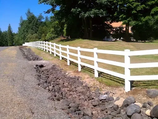 White ranch fence rural property driveway
